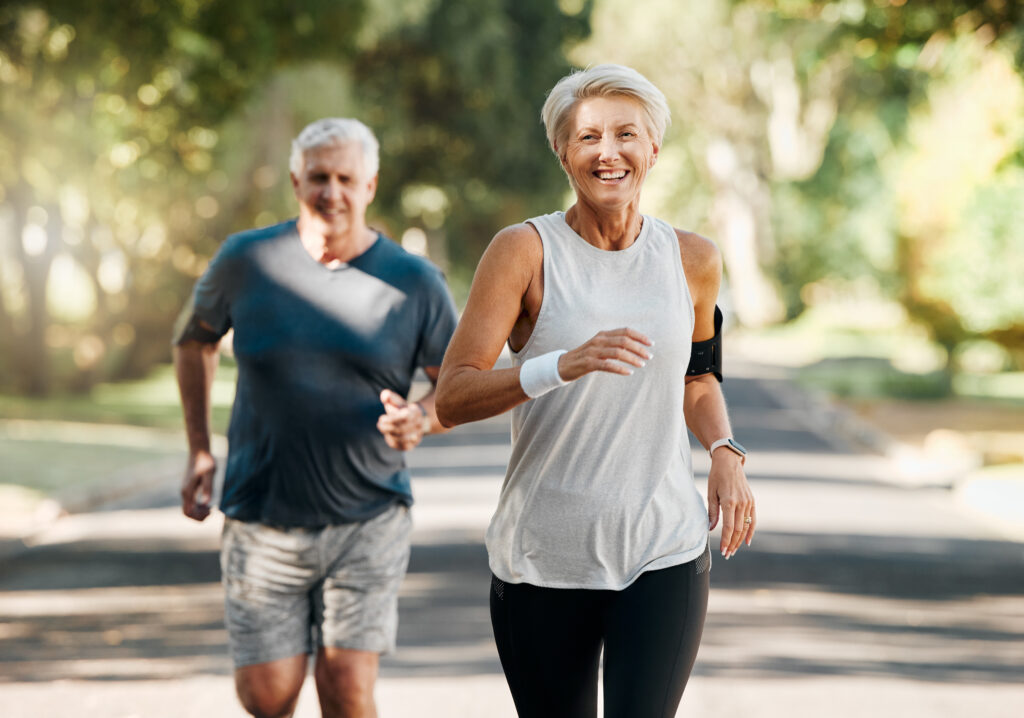 retirement, couple and running fitness health for body and heart wellness with natural ageing. married, mature and senior people enjoy nature run together for cardiovascular vitality workout.